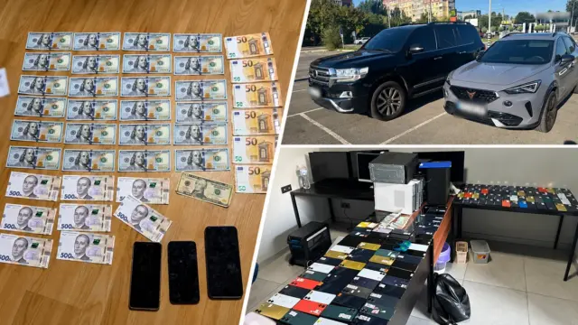 У Дніпрі поліція провела 21 обшук через мережу call-центрів та вилучила авто і валюту